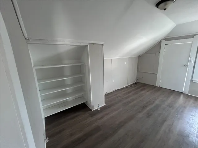 a view of an empty walk in closet
