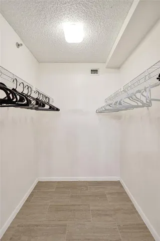 a view of a room with rack on the wall