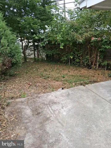 a view of backyard with outdoor space
