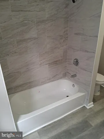 a bathroom with a bathtub