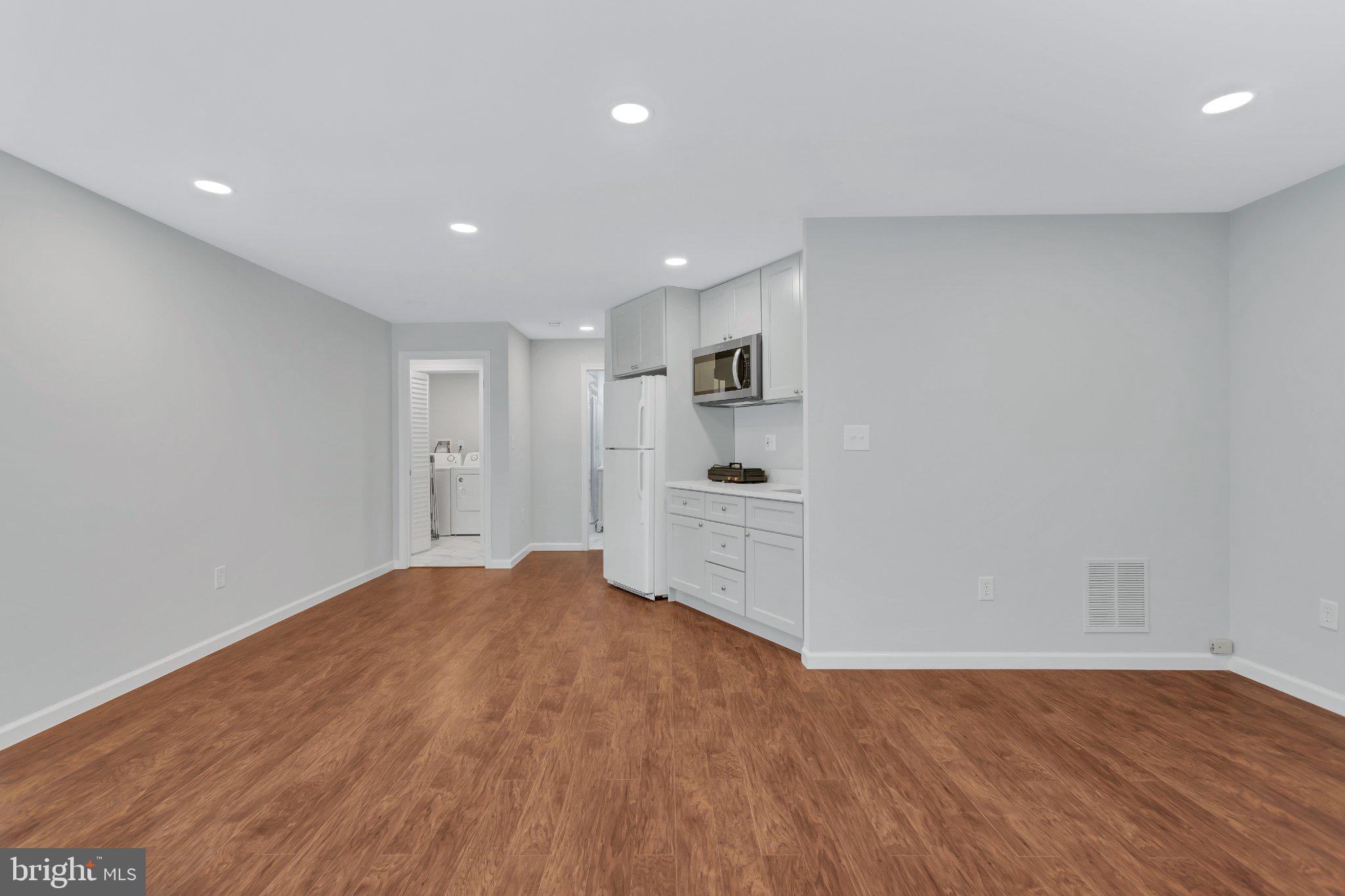 9009 Sweet Birch Court Springfield, VA 22152 - Photo 30 of 34 Modern space with warm wood floors.