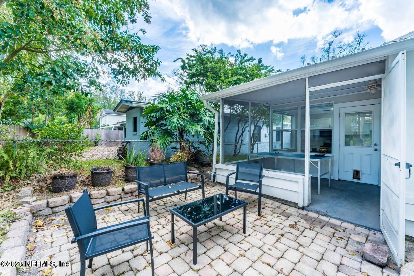 1247 Rensselaer Avenue Jacksonville, FL 32205 - Photo 21 of 24 a outdoor living space with furniture and a potted plant