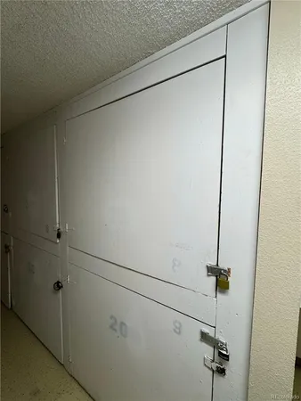 a view of a livingroom with furniture and windows