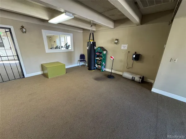 a view of an empty room with windows