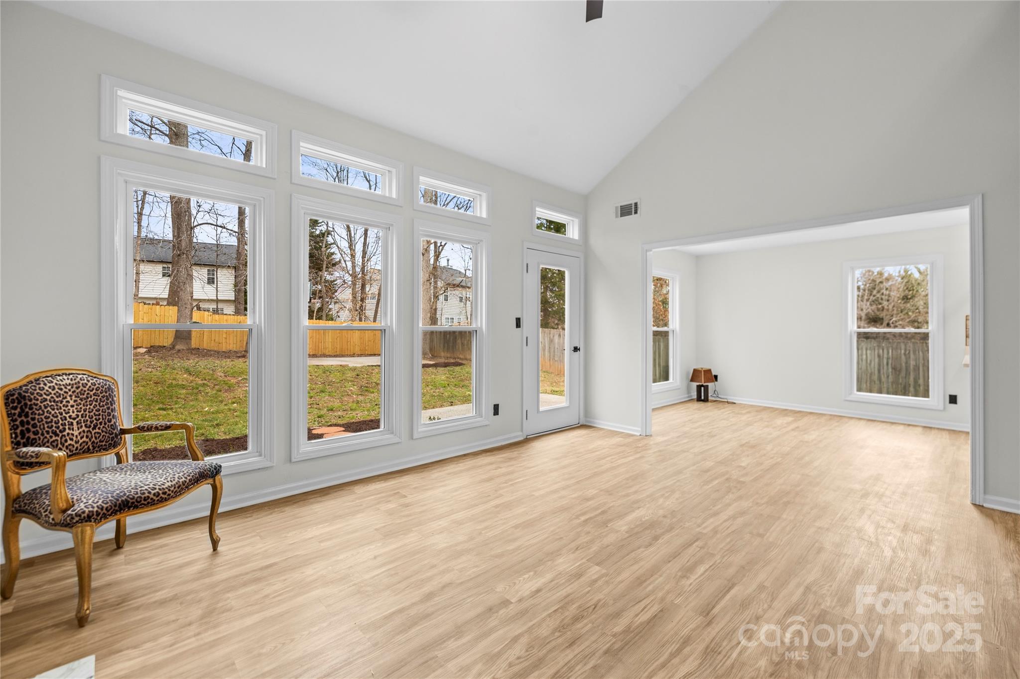 10211 Ridgewell Court Charlotte, NC 28215 - Photo 11 of 41 a view of a livingroom with workspace and a window