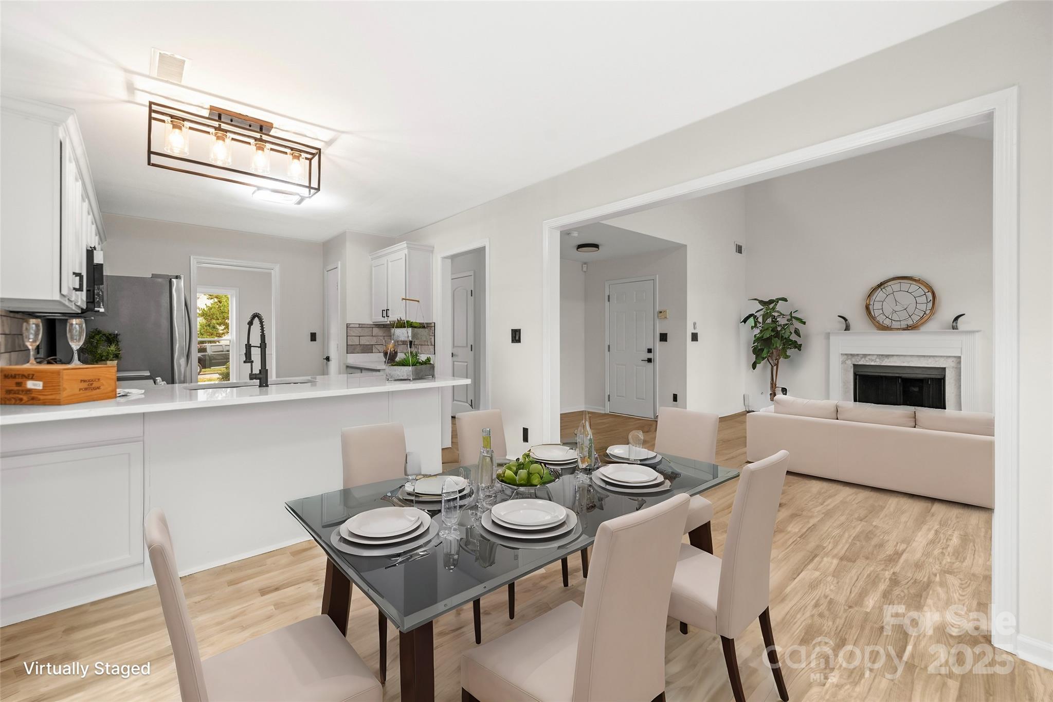 10211 Ridgewell Court Charlotte, NC 28215 - Photo 17 of 41 a view of a dining room with furniture