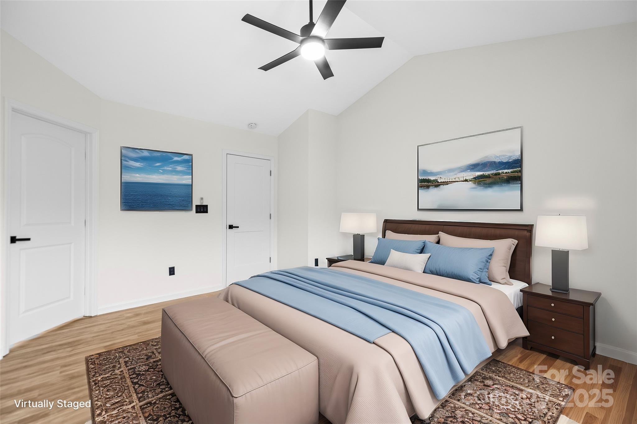 10211 Ridgewell Court Charlotte, NC 28215 - Photo 20 of 41 a bedroom with a large bed and a chandelier