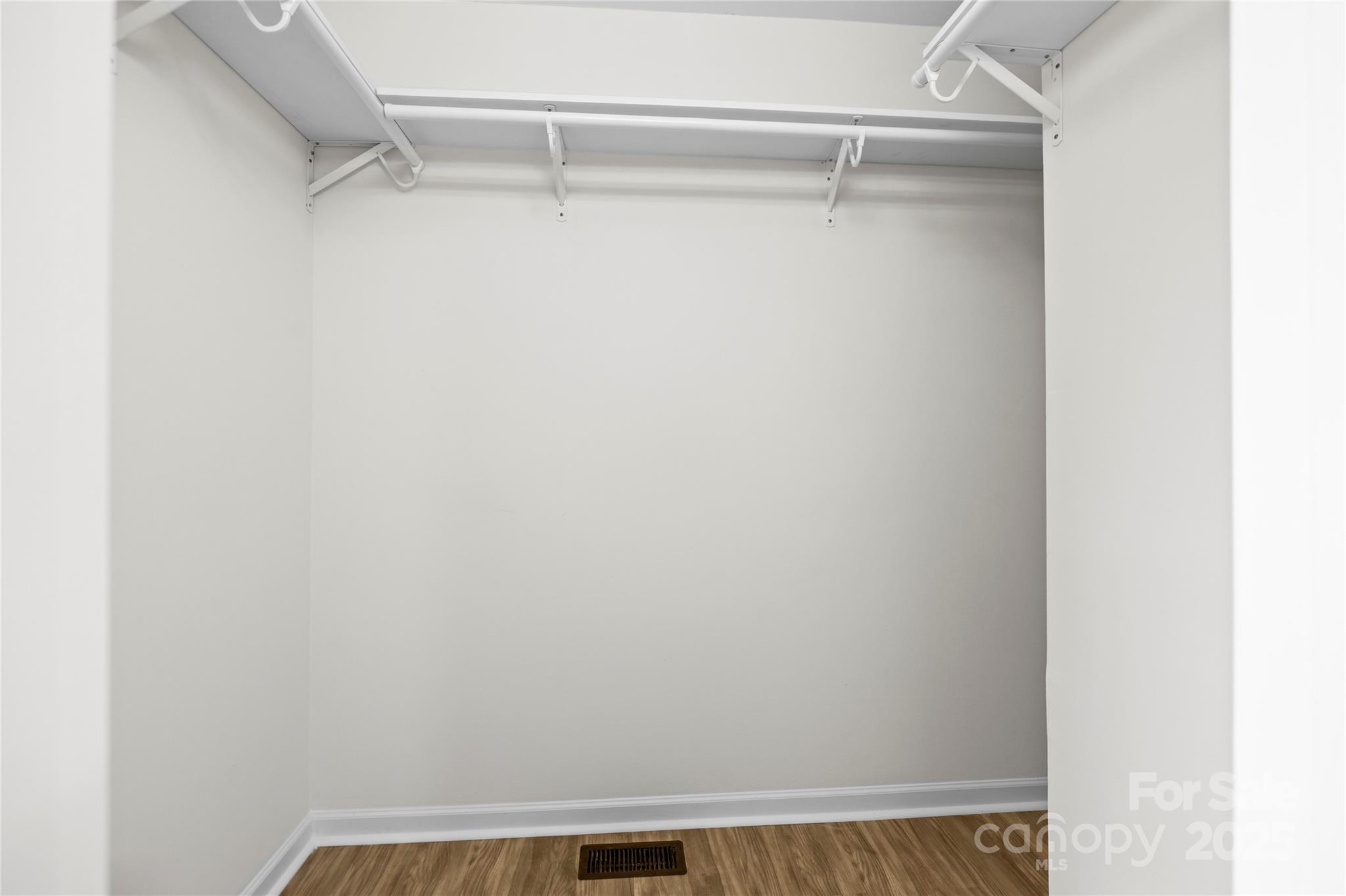 10211 Ridgewell Court Charlotte, NC 28215 - Photo 24 of 41 a view of a room with racks on the wall