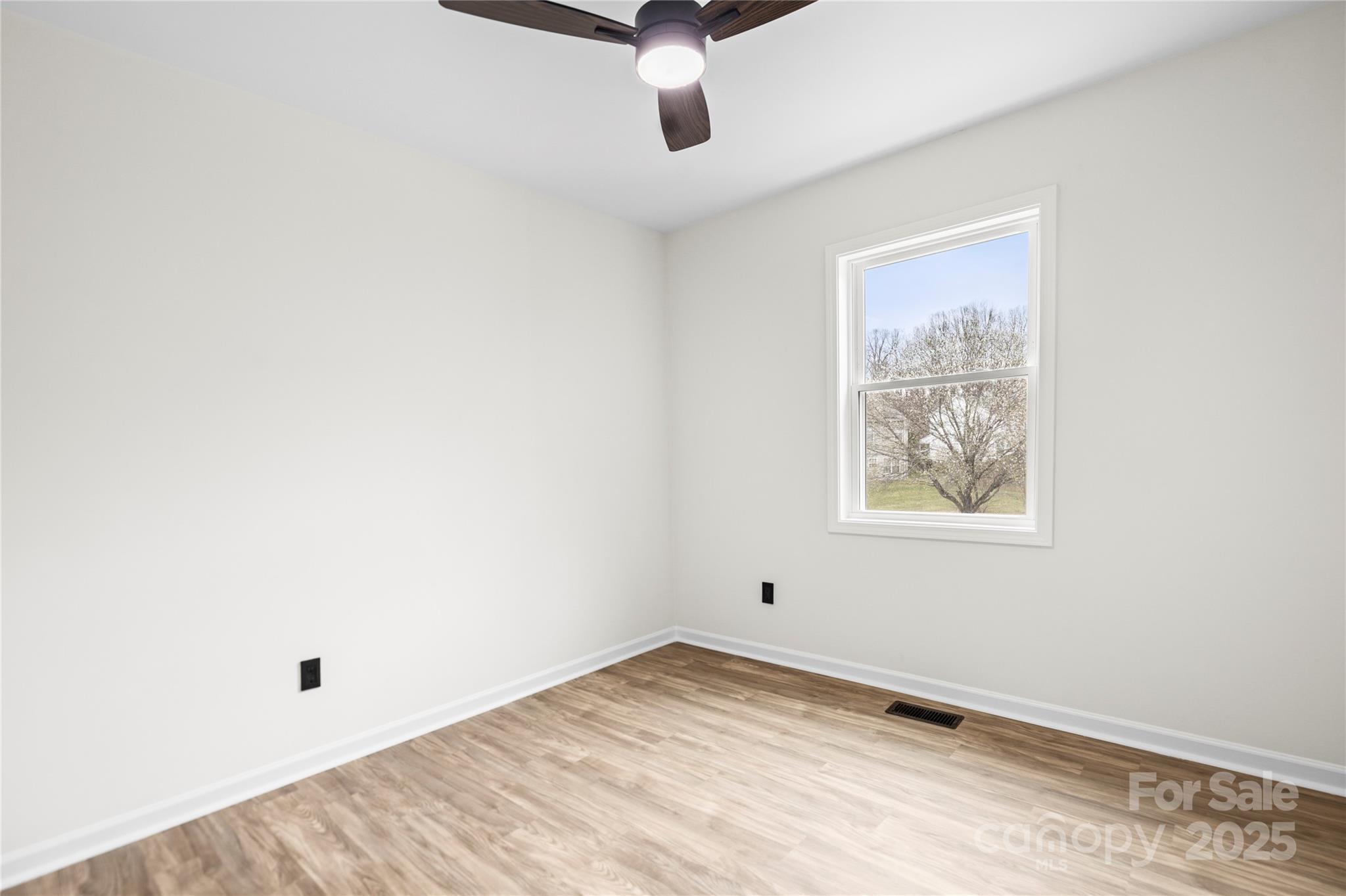 10211 Ridgewell Court Charlotte, NC 28215 - Photo 30 of 41 an empty room with window