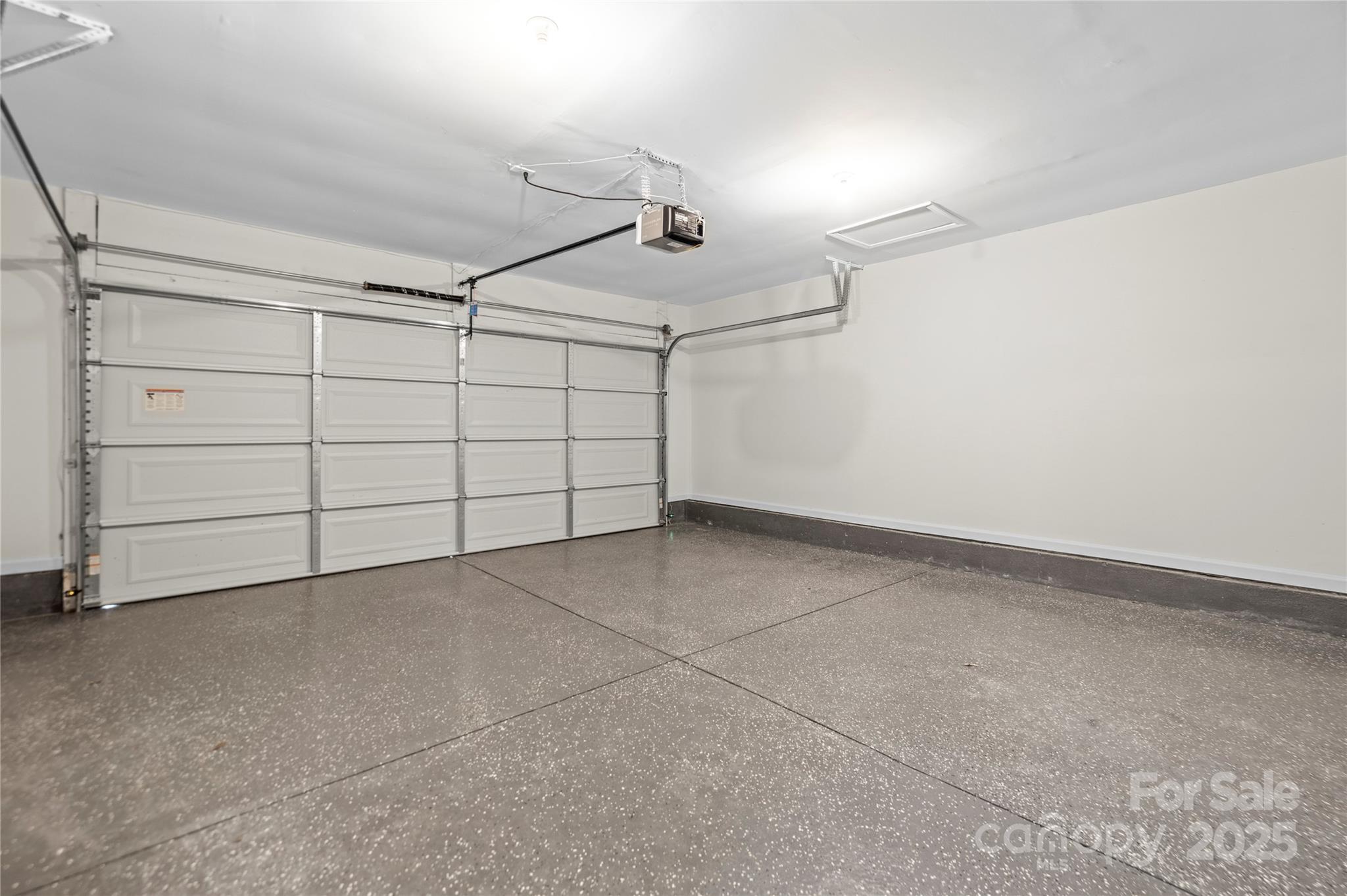 10211 Ridgewell Court Charlotte, NC 28215 - Photo 37 of 41 a view of a garage