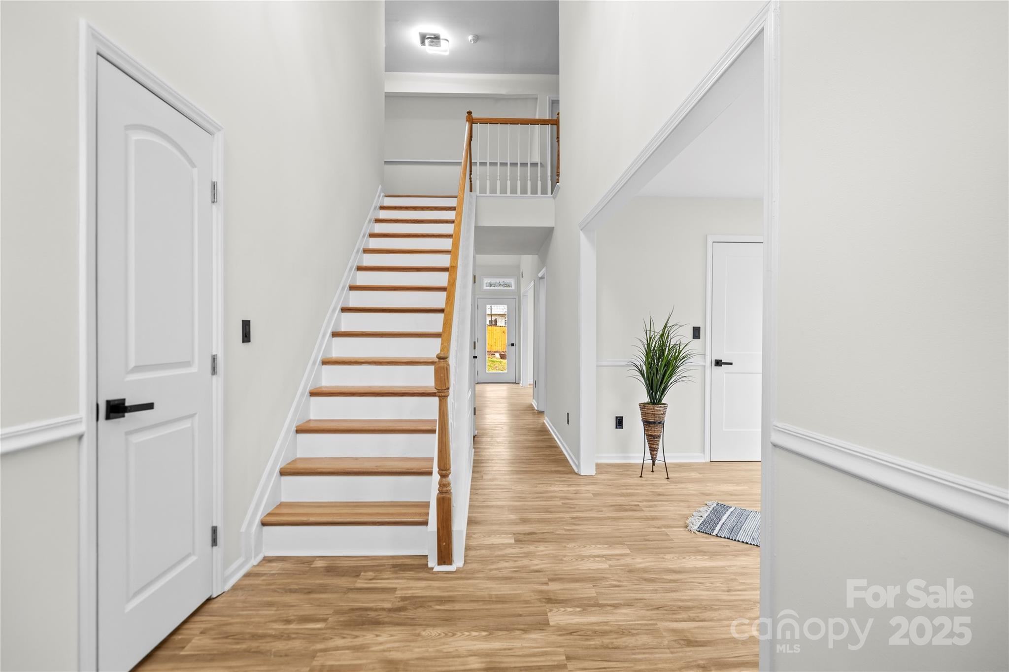 10211 Ridgewell Court Charlotte, NC 28215 - Photo 4 of 41 a view of entryway with wooden floor