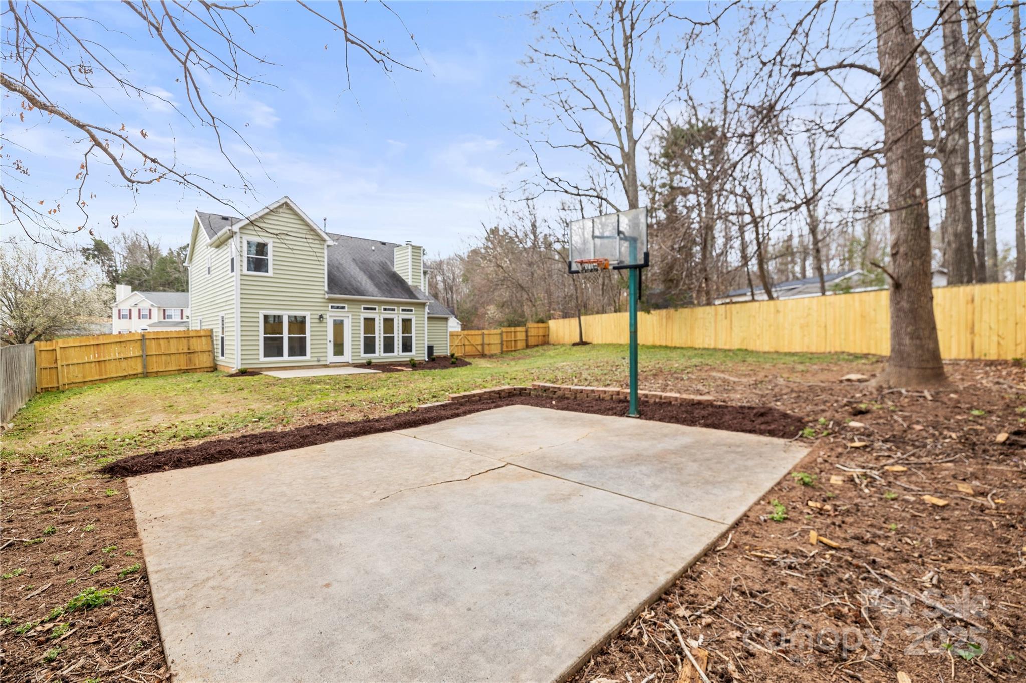 10211 Ridgewell Court Charlotte, NC 28215 - Photo 41 of 41 a house with yard in front of it