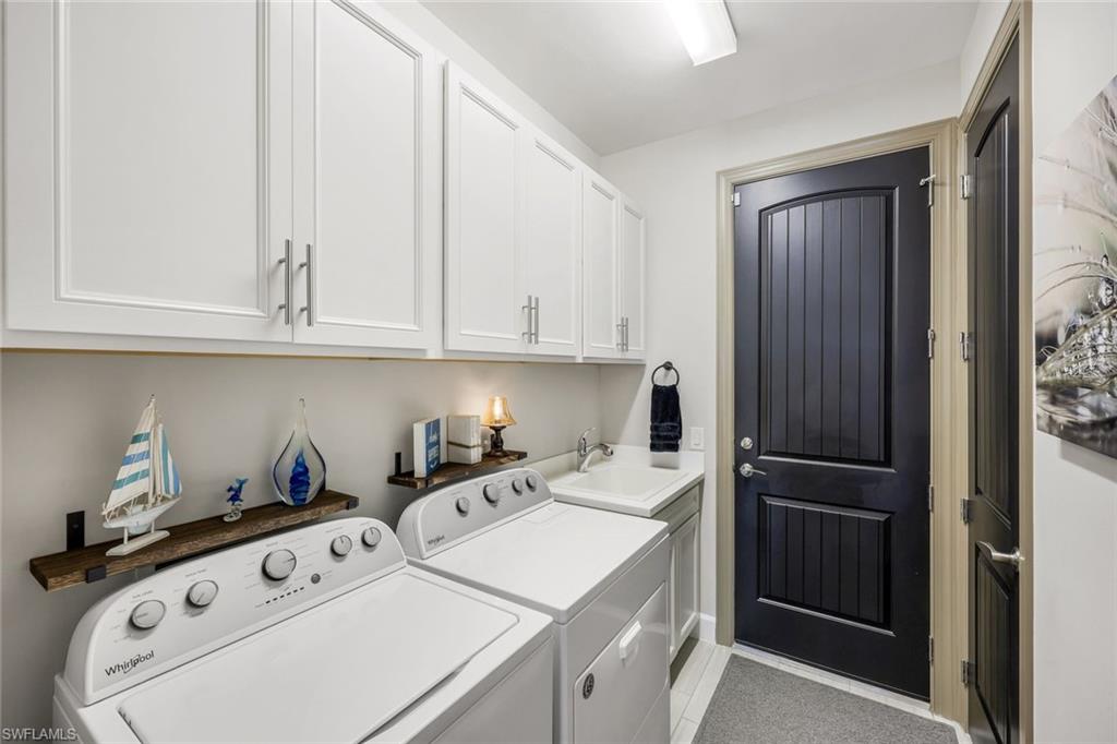 20022 Parrot Key Court Estero, FL 33928 - Photo 17 of 31 a room with storage and utility