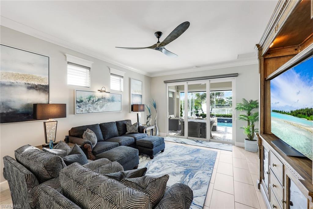 20022 Parrot Key Court Estero, FL 33928 - Photo 8 of 31 a living room with furniture and a large window
