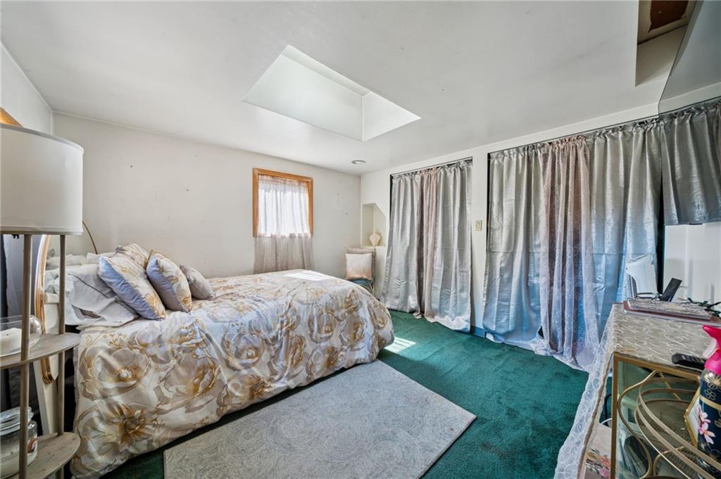 824 Magnus Lane Irwin, PA 15642 - Photo 16 of 40 a living room with furniture and a fireplace