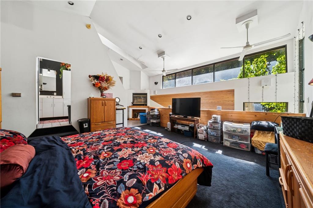 824 Magnus Lane Irwin, PA 15642 - Photo 20 of 40 a bedroom with furniture and a flat screen tv