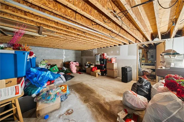 a view of a house with a yard and pathway