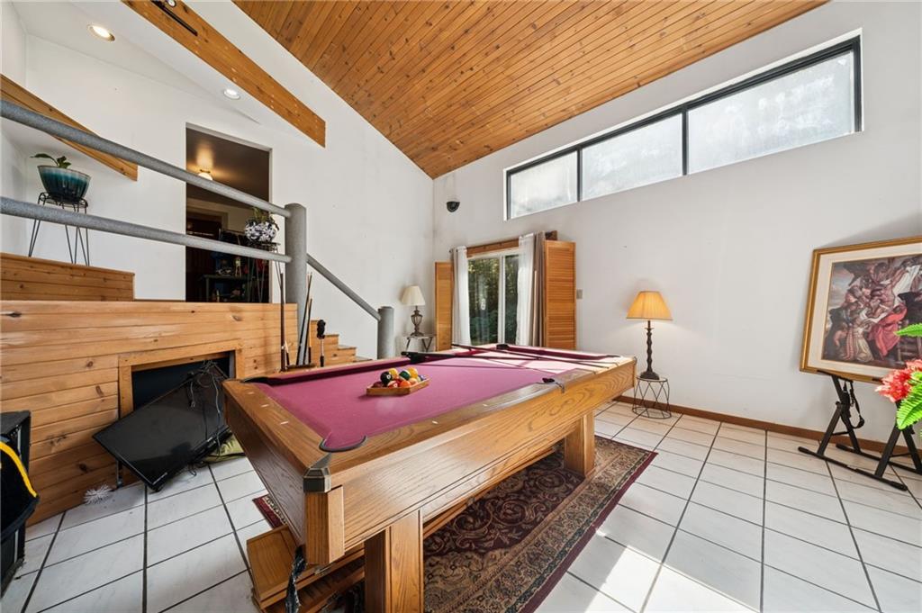 824 Magnus Lane Irwin, PA 15642 - Photo 10 of 40 a patio with table and chairs and potted plants