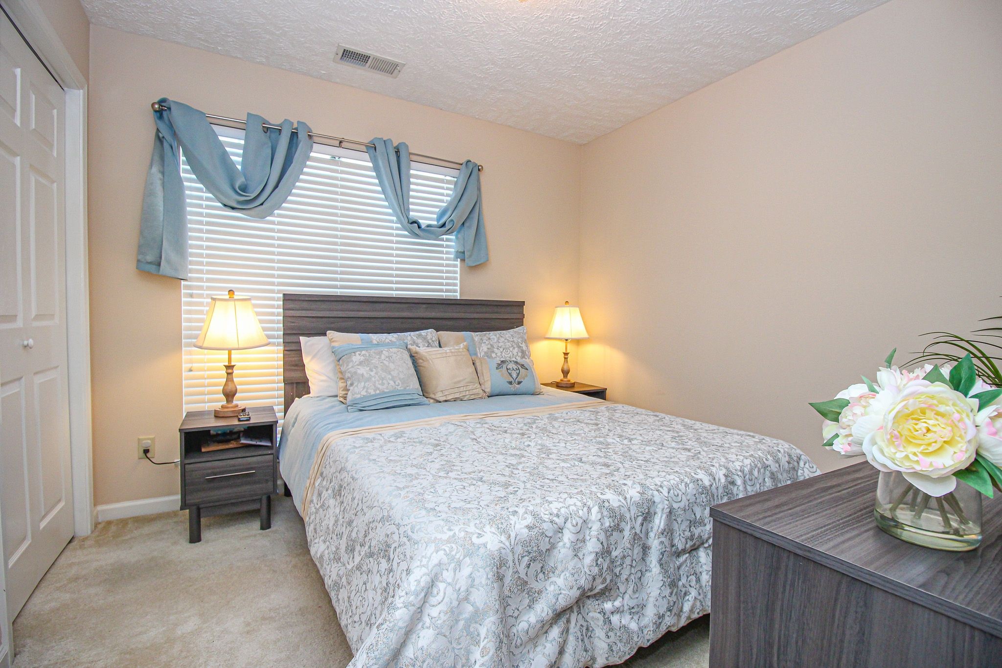 9 Battlefield Cove Jackson, TN 38305 - Photo 11 of 24 a bedroom with a bed and dresser