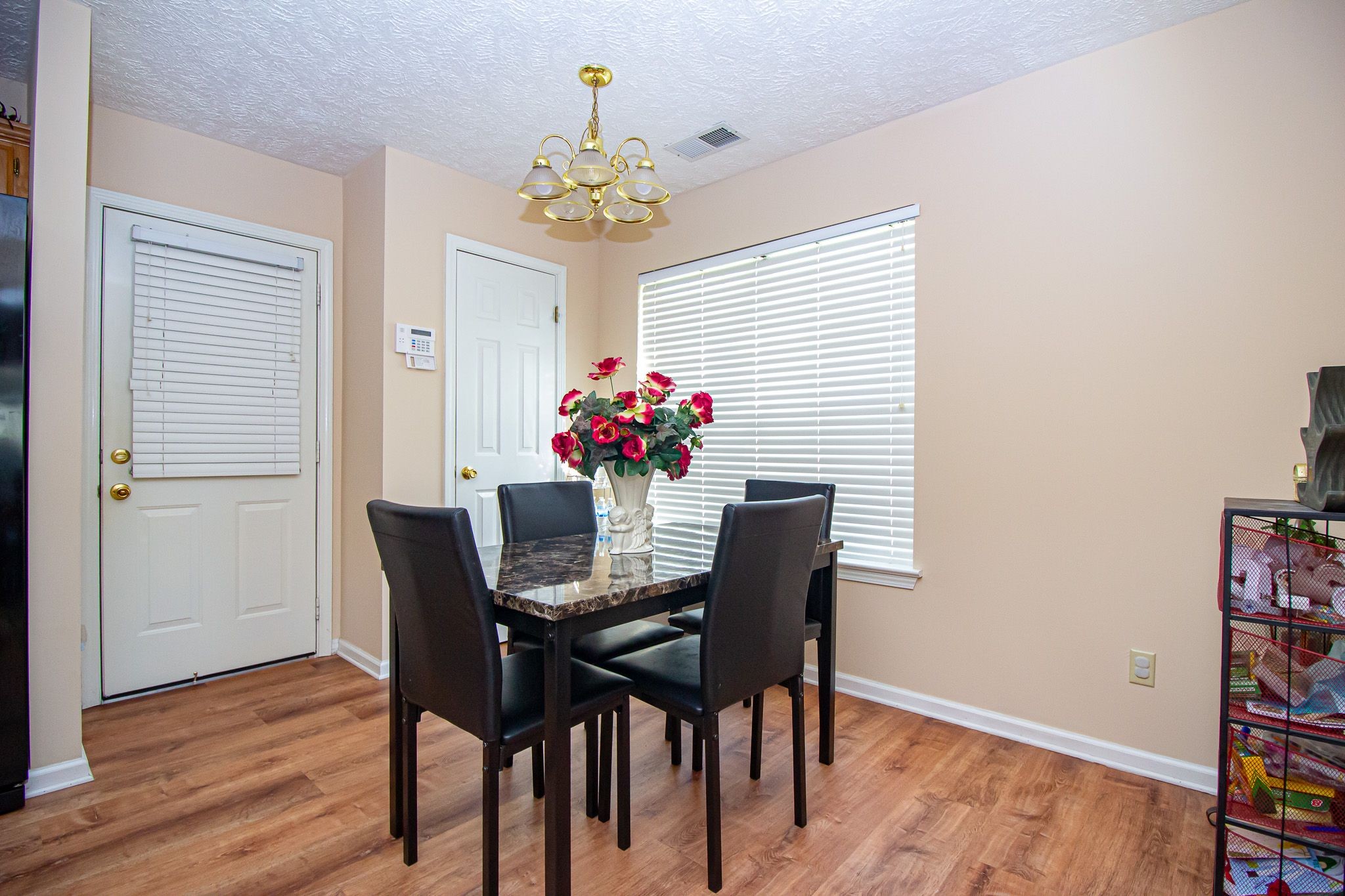 9 Battlefield Cove Jackson, TN 38305 - Photo 15 of 24 a dining room with furniture and wooden floor