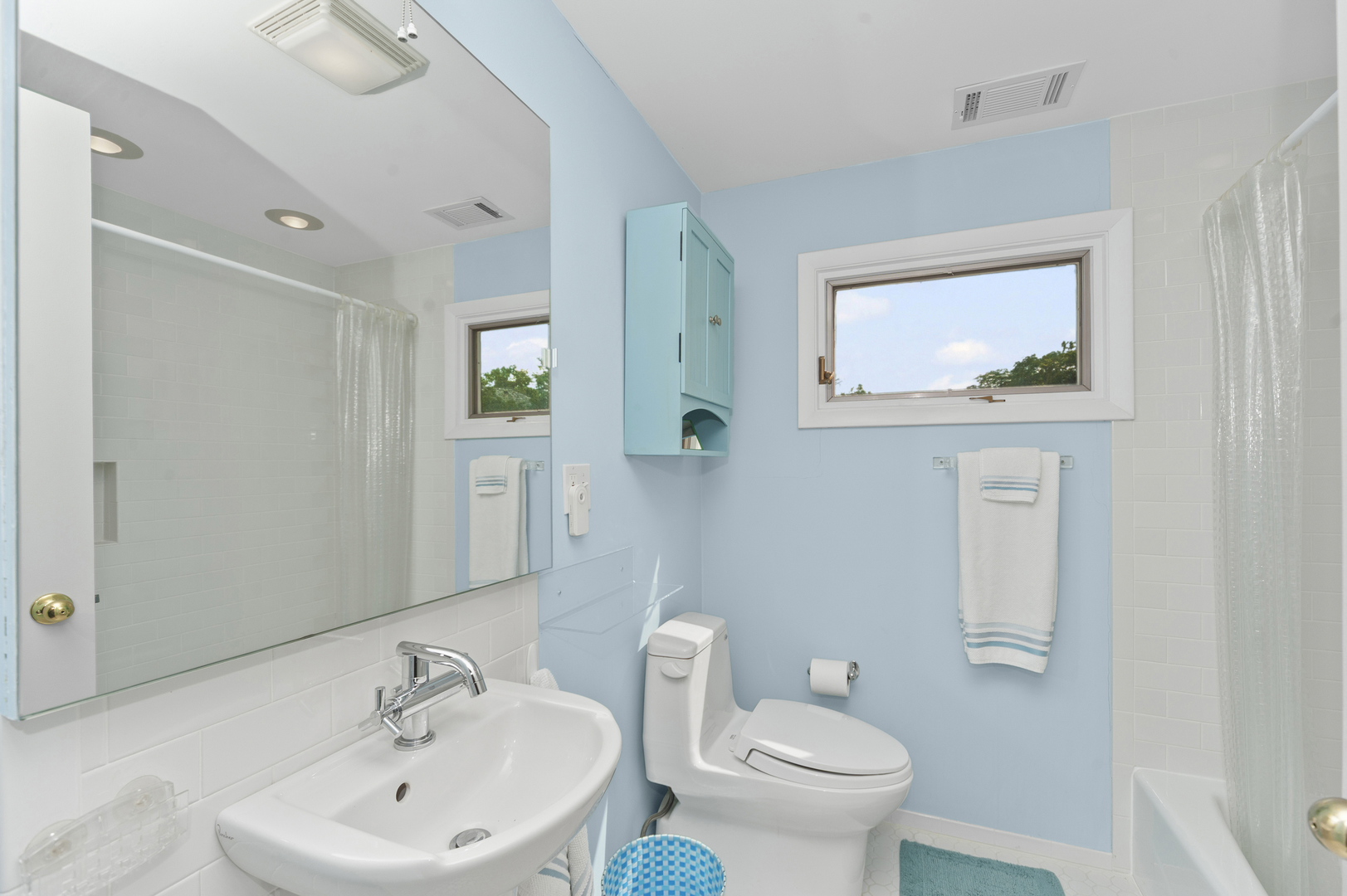 1128 Green Bay Road Glencoe, IL 60022 - Photo 16 of 28 a bathroom with a toilet sink and mirror