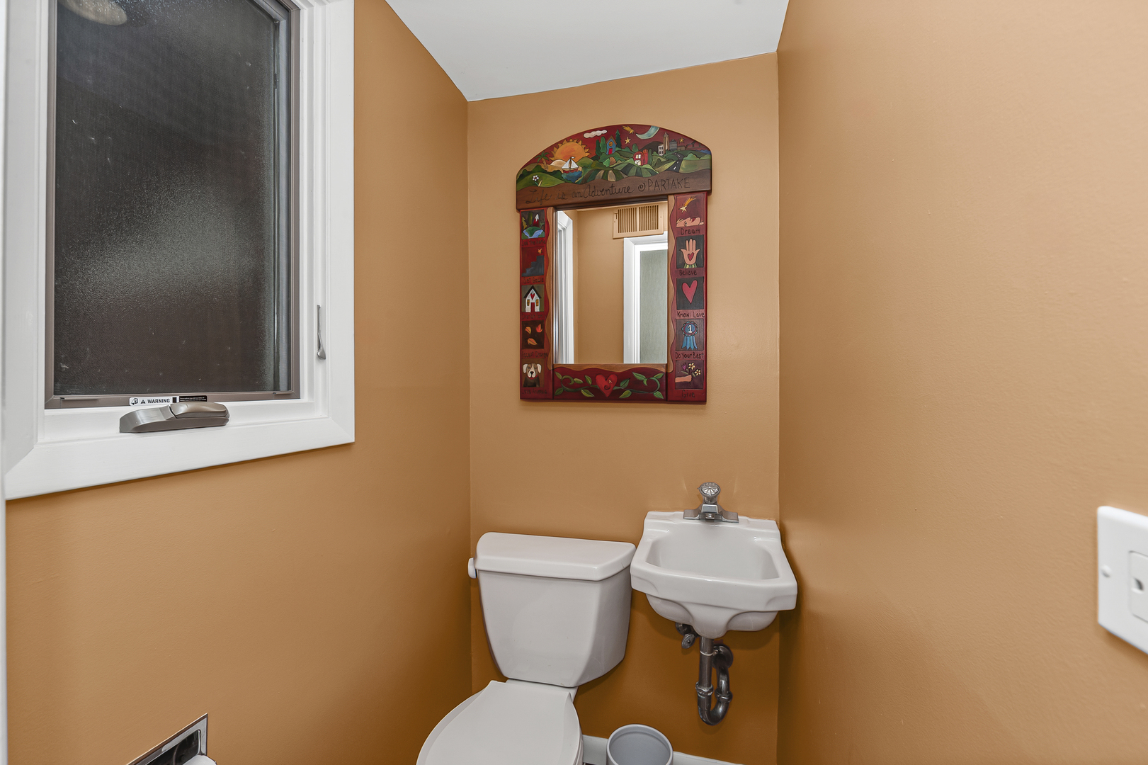 1128 Green Bay Road Glencoe, IL 60022 - Photo 18 of 28 a bathroom with a toilet sink and mirror