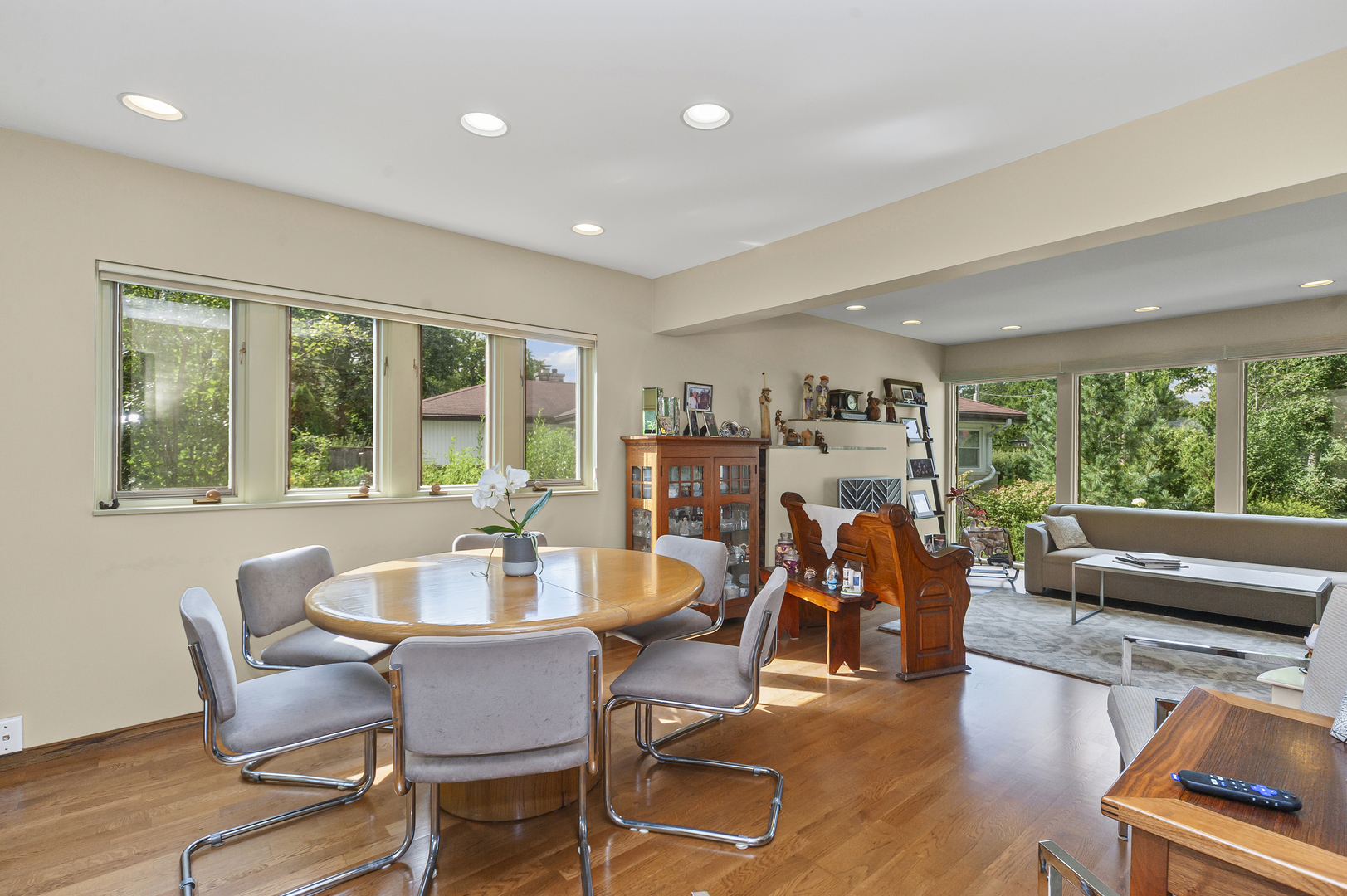 1128 Green Bay Road Glencoe, IL 60022 - Photo 7 of 28 a view of a dining room with furniture large windows and wooden floor
