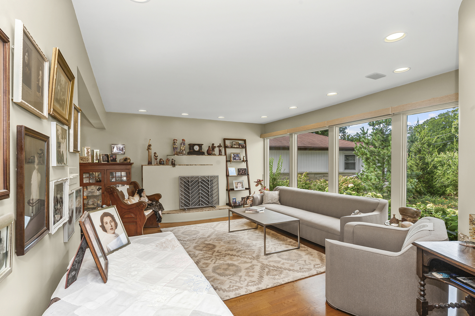 1128 Green Bay Road Glencoe, IL 60022 - Photo 10 of 28 a living room with furniture large window and a fireplace