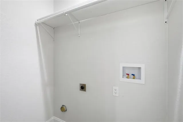 a bathroom with a shower and a shower