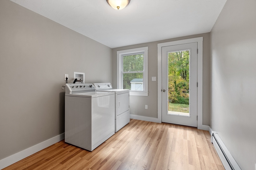 34 Morse Road Royalston, MA 01368 - Photo 34 of 42 a utility room with wooden floor washer and dryer