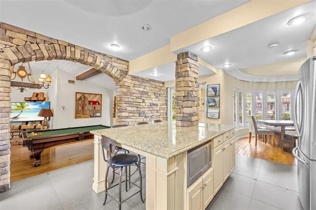 a room with a table and chairs