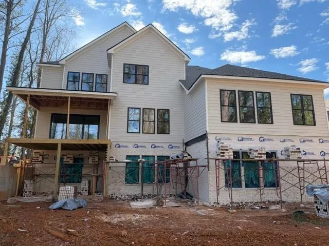 a front view of a house with glass windows