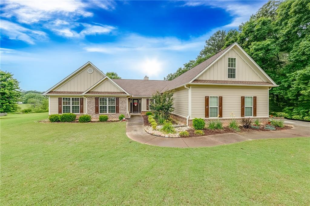 74 Emma Lane Winder, GA 30680 - Photo 1 of 1 a front view of house with yard and green space