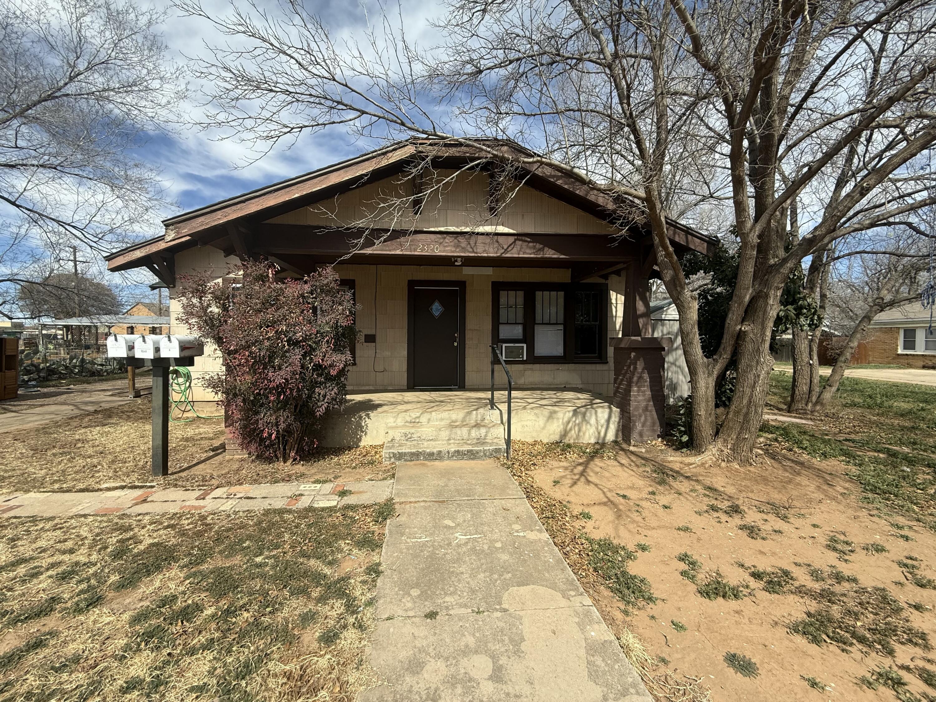 2320 21st Street Lubbock, TX 79411 - Photo 1 of 29 a view of a house with snow on the wall