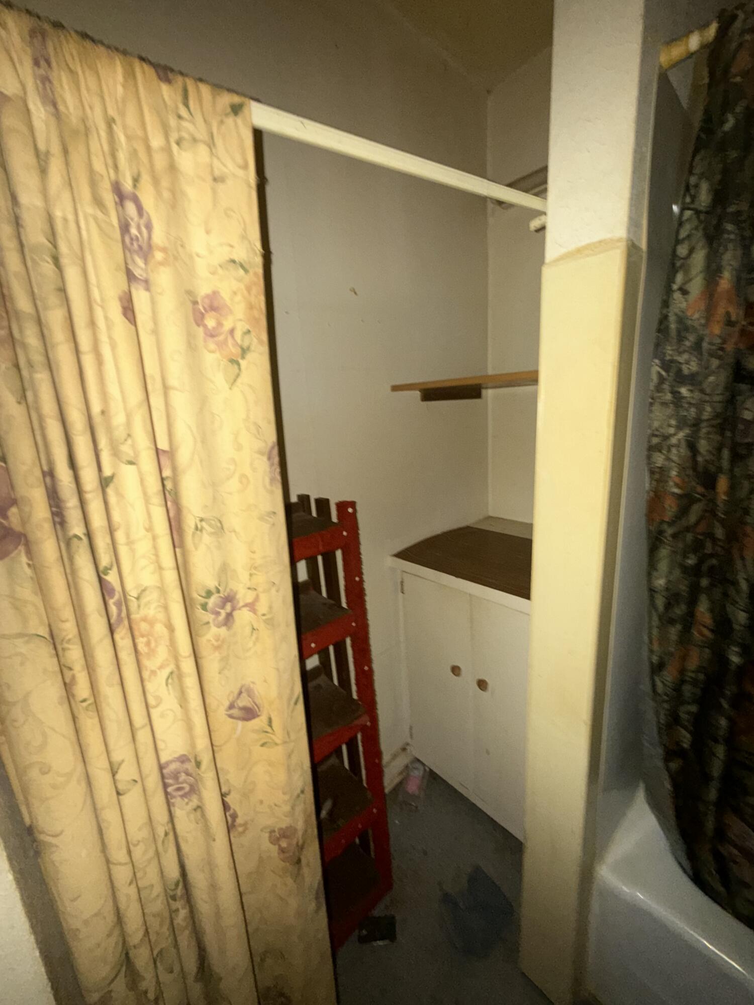 2320 21st Street Lubbock, TX 79411 - Photo 19 of 29 a bathroom with a shower and a sink