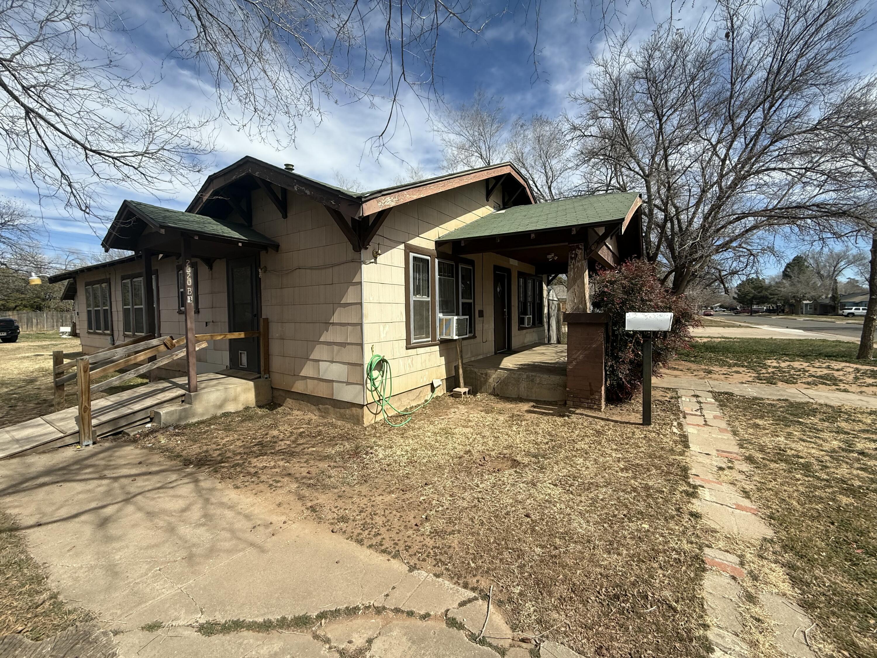2320 21st Street Lubbock, TX 79411 - Photo 2 of 29 a view of a house with a patio