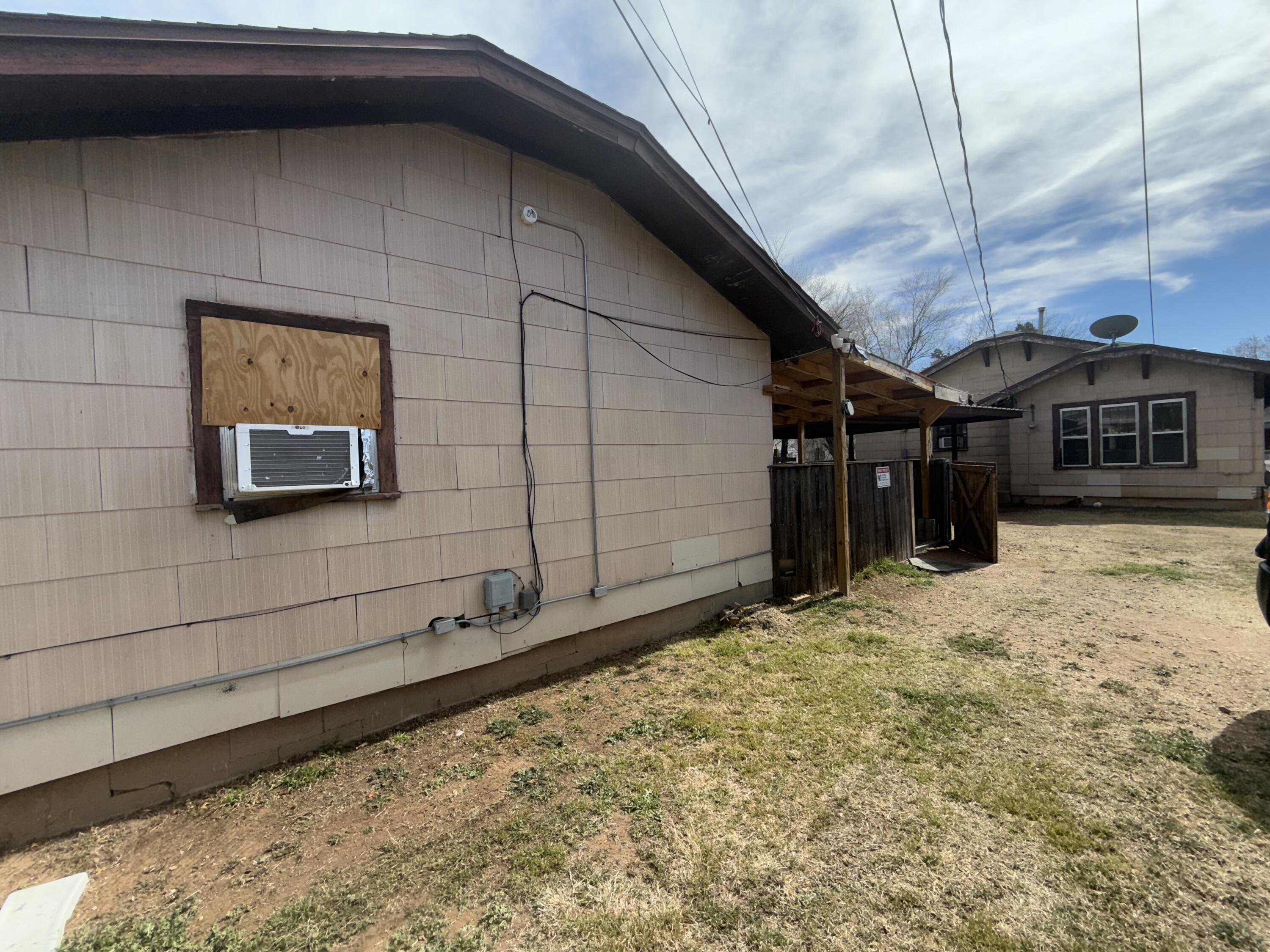 2320 21st Street Lubbock, TX 79411 - Photo 5 of 29 a backyard of a house