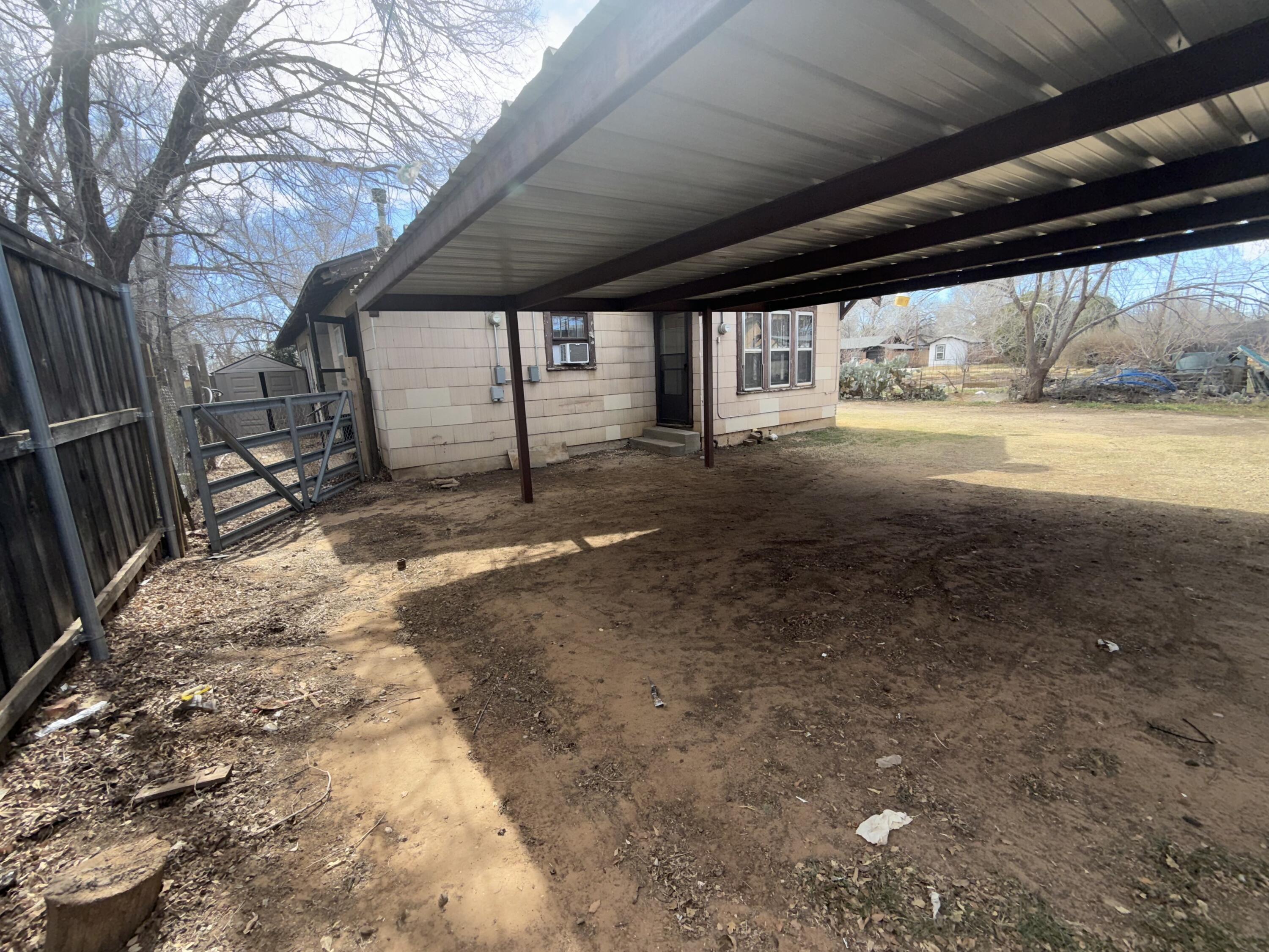 2320 21st Street Lubbock, TX 79411 - Photo 10 of 29 a view of backyard with large trees