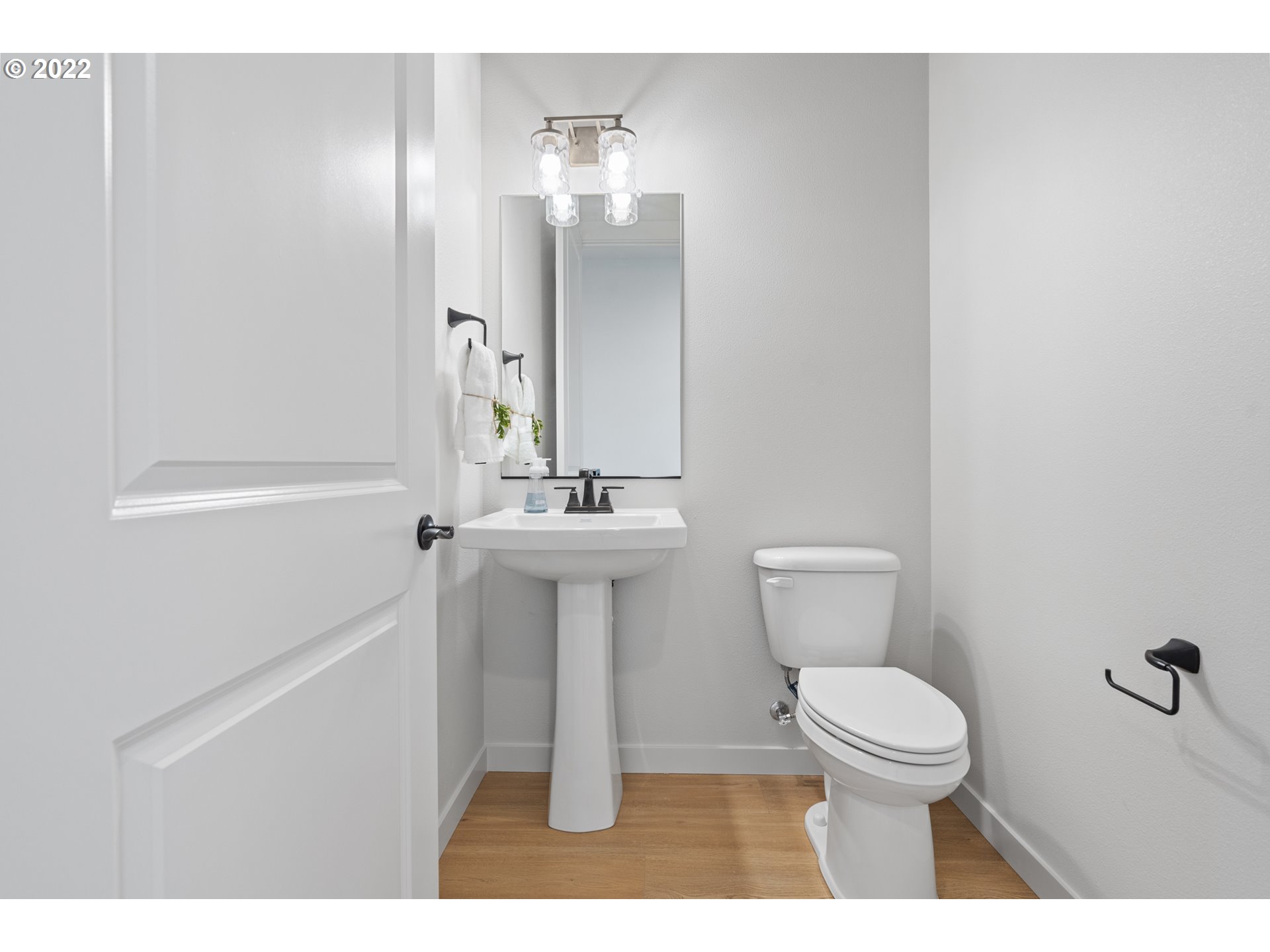 818 South 88th Avenue Ridgefield, WA 98642 - Photo 31 of 32 a bathroom with a sink a toilet and shower