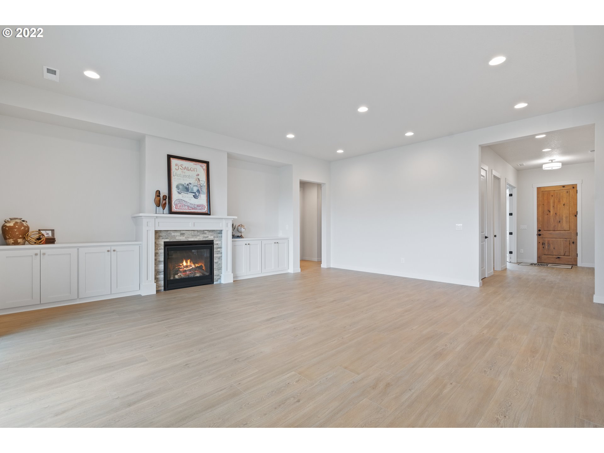 818 South 88th Avenue Ridgefield, WA 98642 - Photo 4 of 32 a view of an empty room with a fireplace