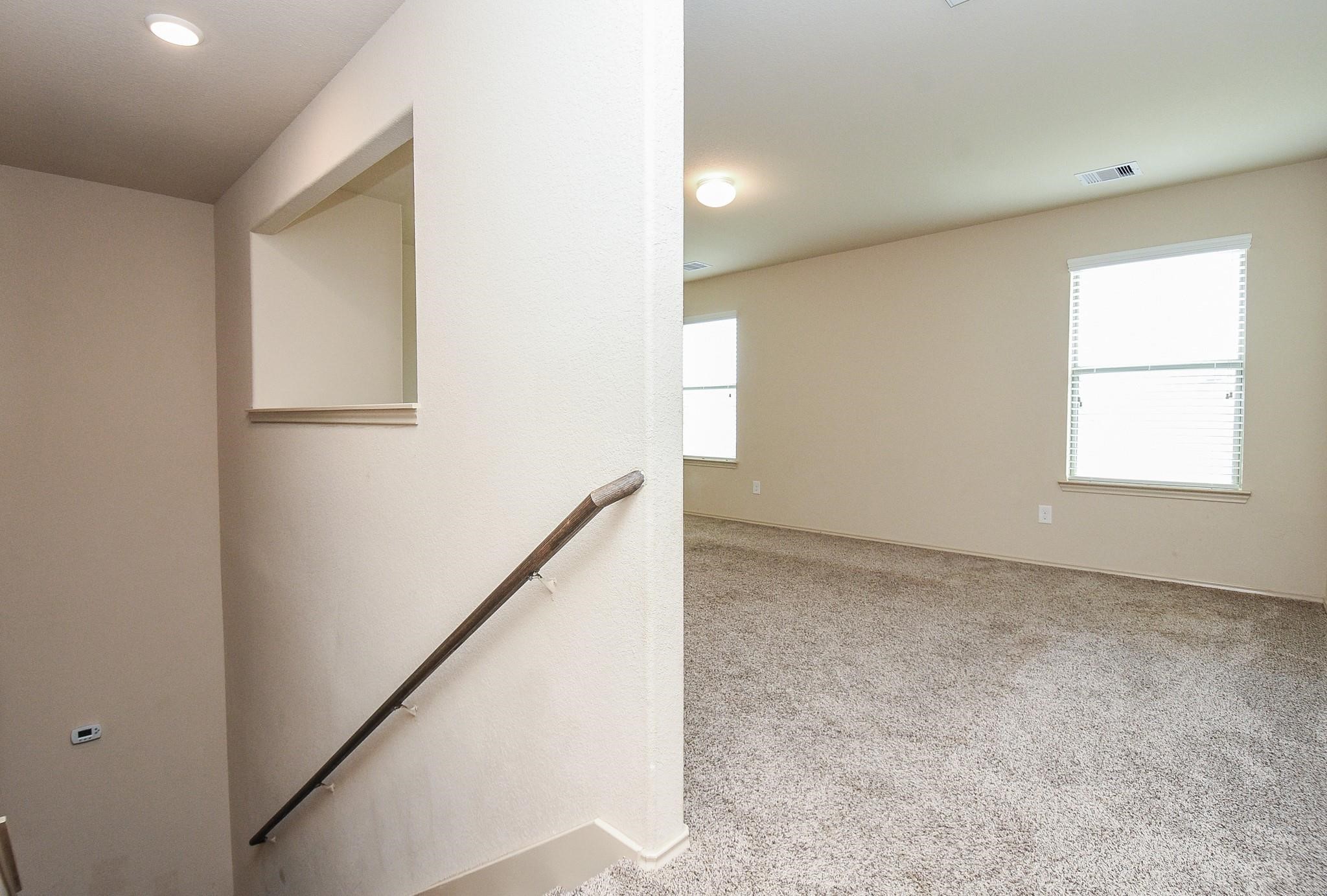 23306 Joyful Way Spring, TX 77373 - Photo 20 of 32 a view of an empty room with a window