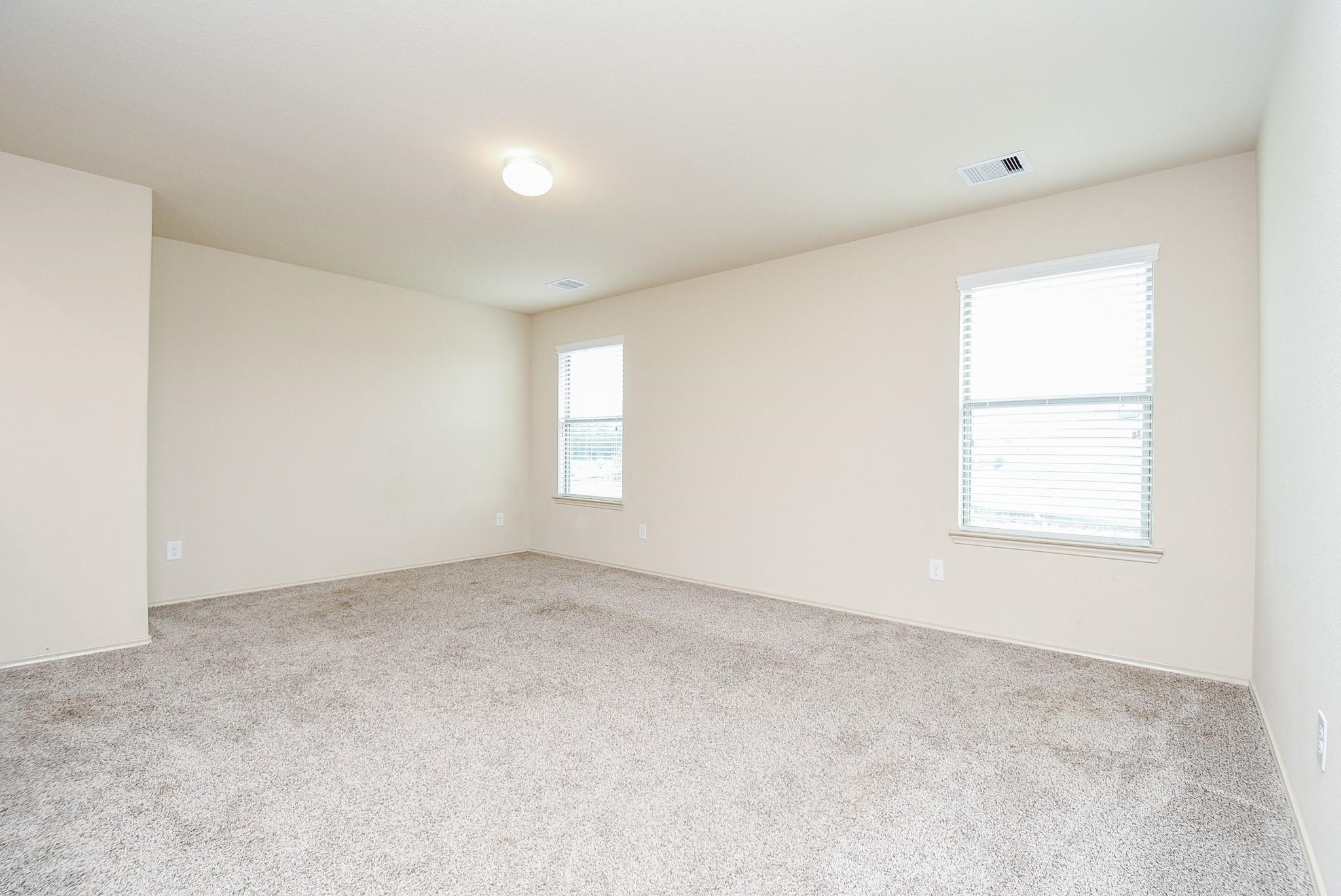 23306 Joyful Way Spring, TX 77373 - Photo 21 of 32 an empty room with windows