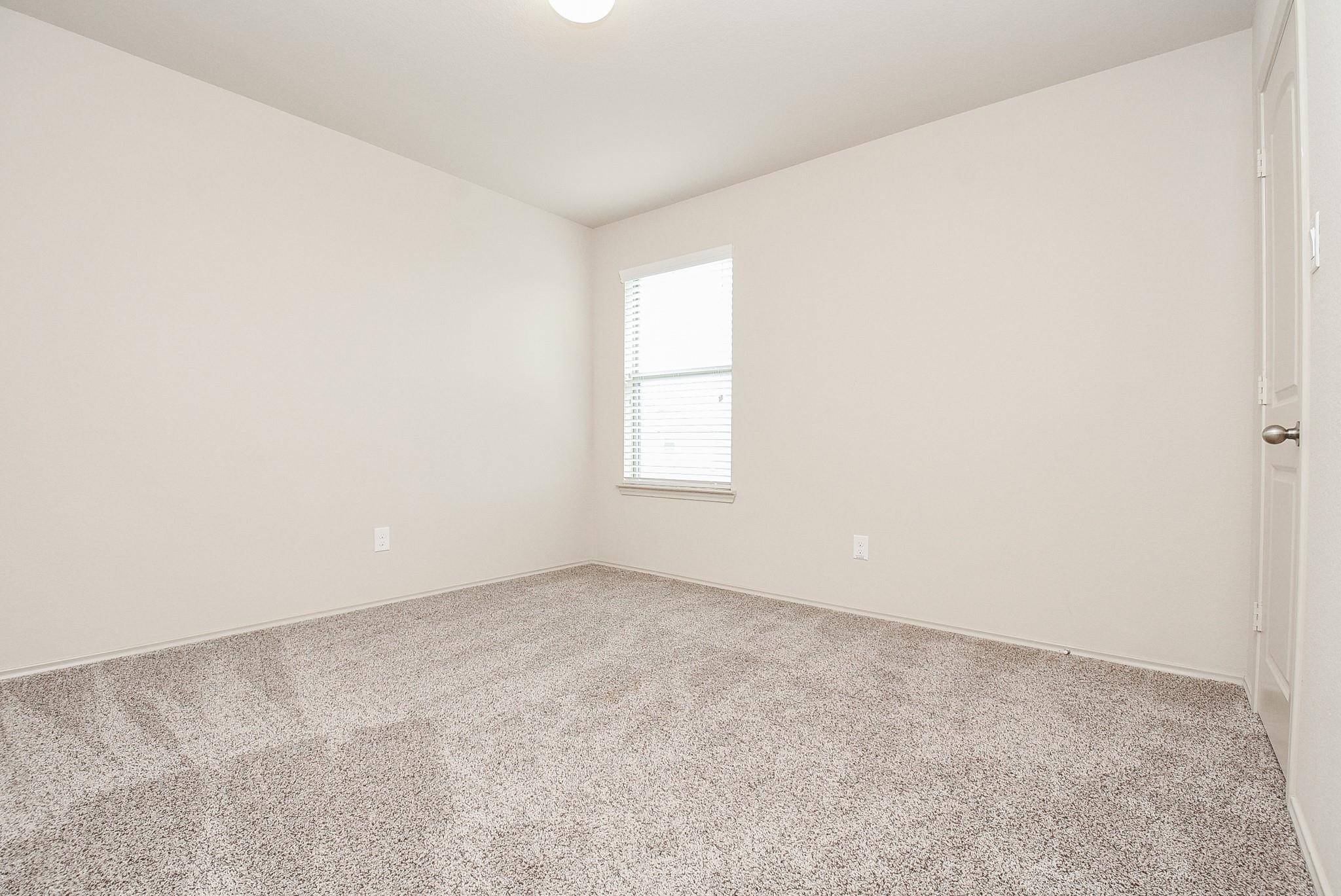 23306 Joyful Way Spring, TX 77373 - Photo 25 of 32 an empty room with windows