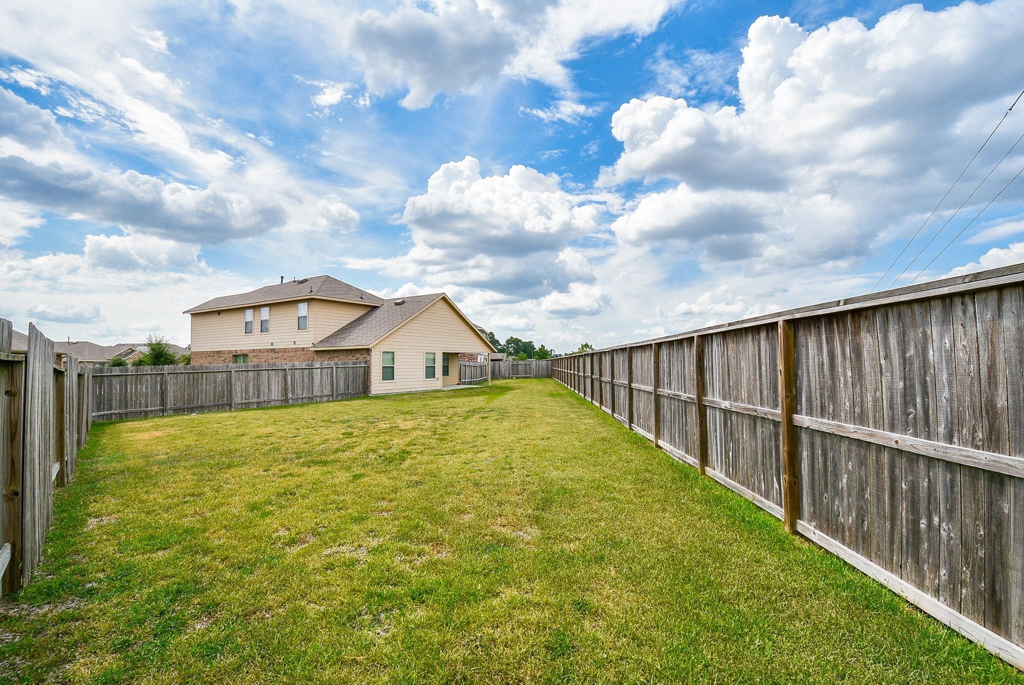 23306 Joyful Way Spring, TX 77373 - Photo 31 of 32 a view of a backyard