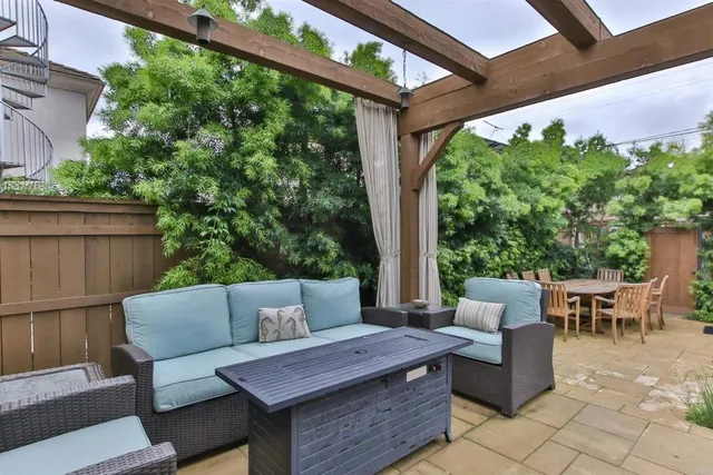 a outdoor living space with furniture and garden view