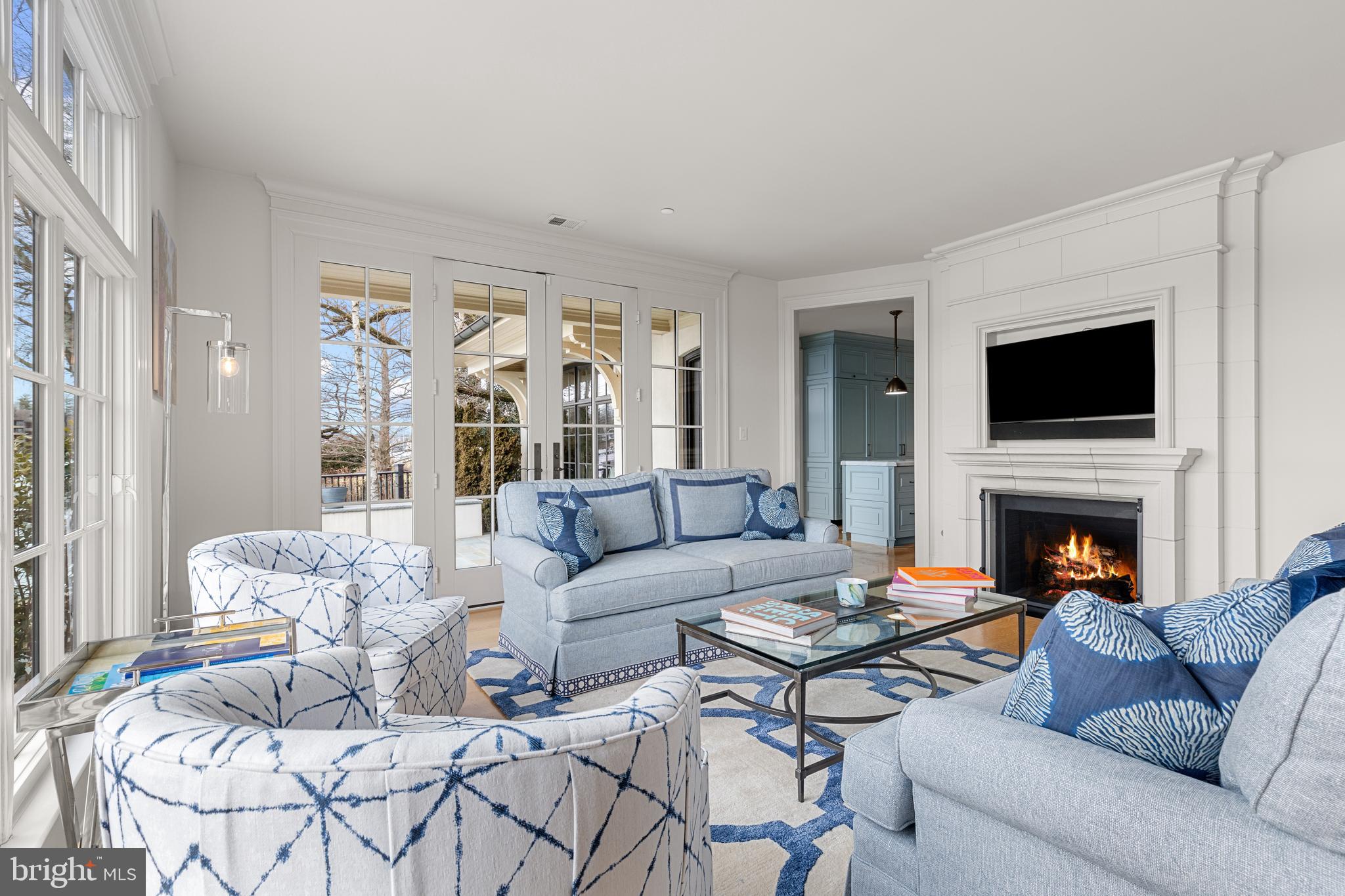 1 Shipwright Harbor Annapolis, MD 21401 - Photo 16 of 39 a living room with furniture fireplace and a flat screen tv