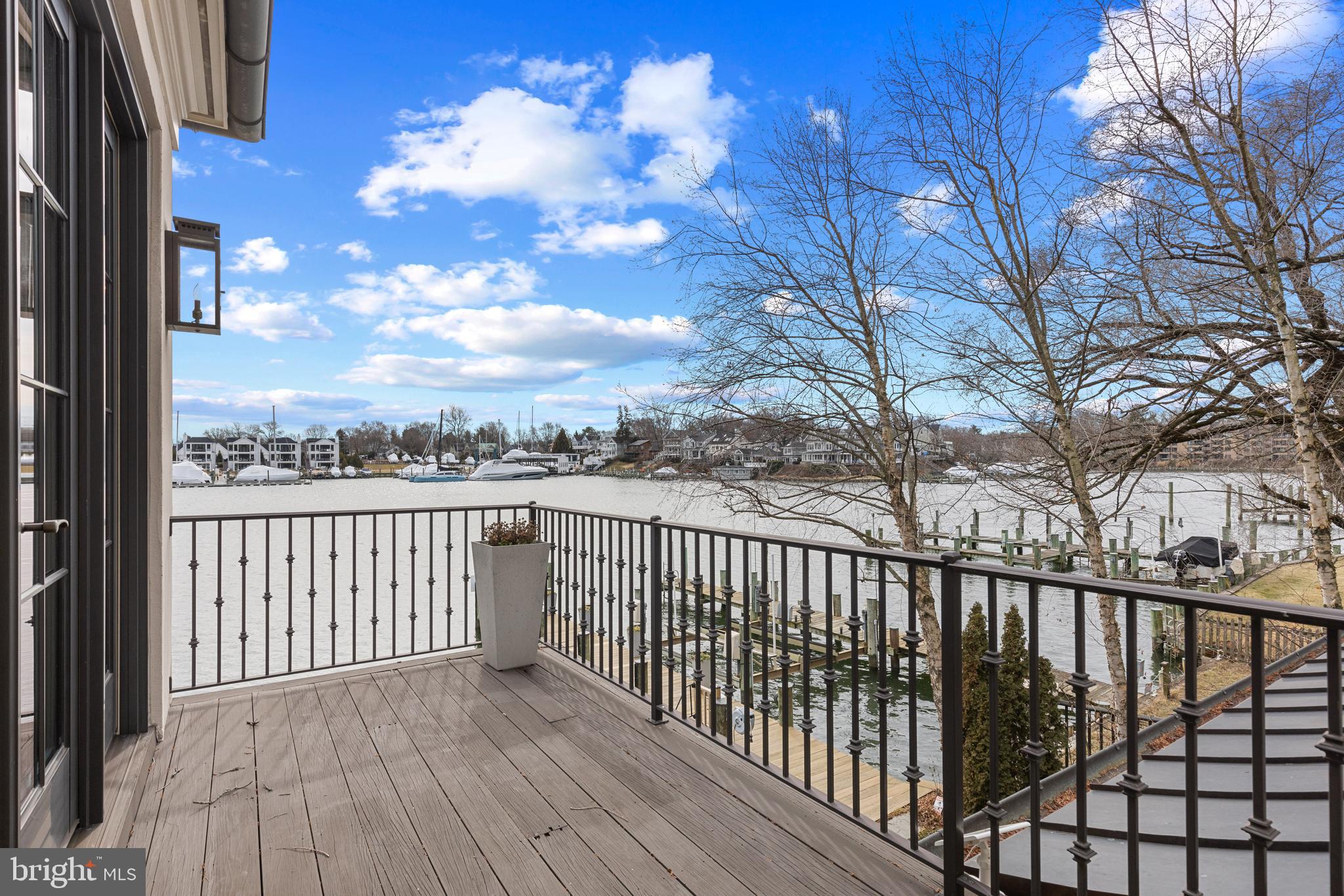 1 Shipwright Harbor Annapolis, MD 21401 - Photo 20 of 39 a view of a balcony with wooden fence