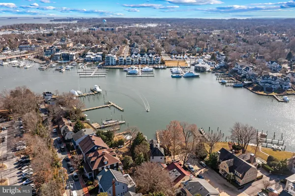 an aerial view of a houses with ocean view