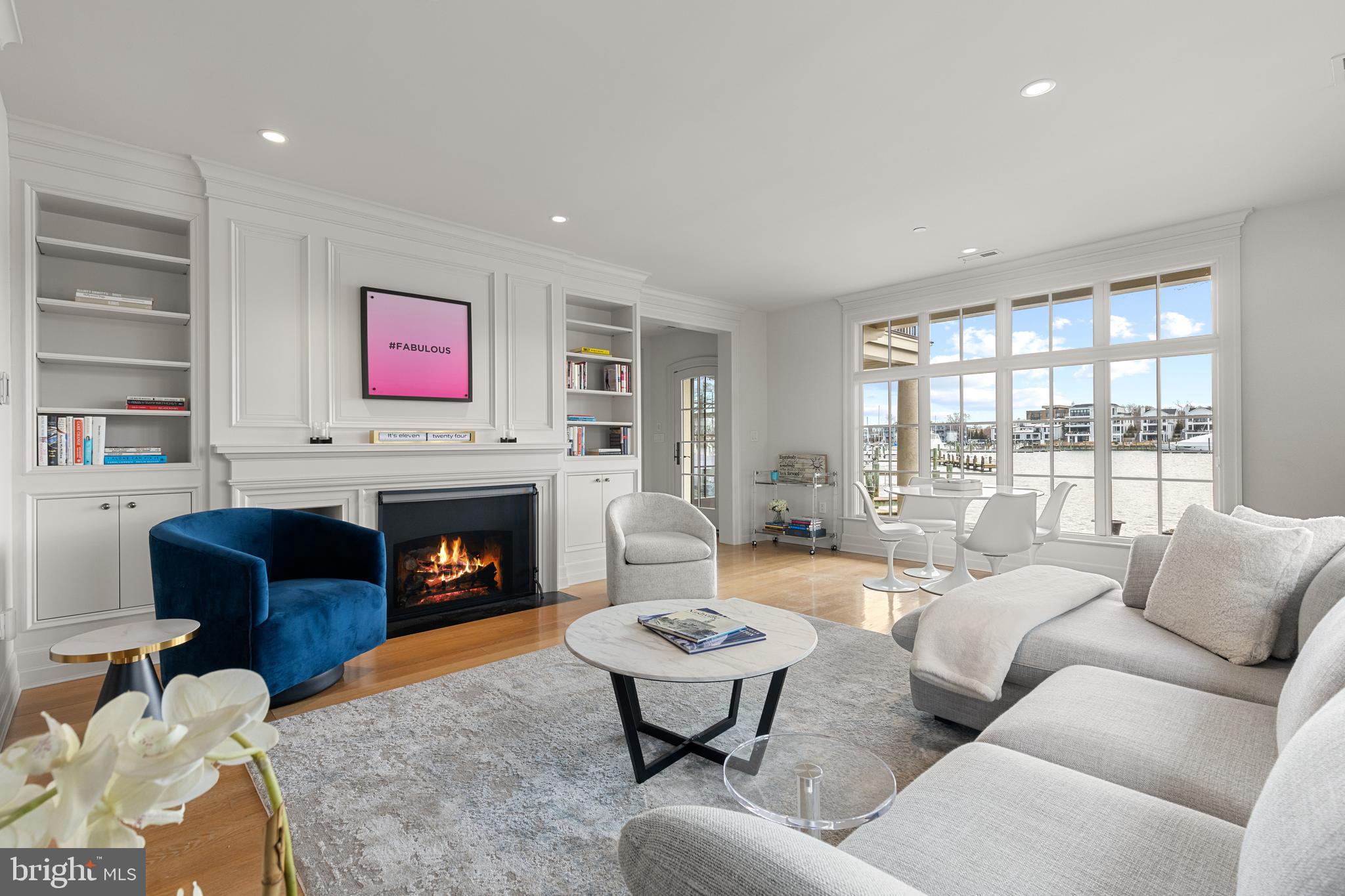 1 Shipwright Harbor Annapolis, MD 21401 - Photo 8 of 39 a living room with furniture fireplace and a large window