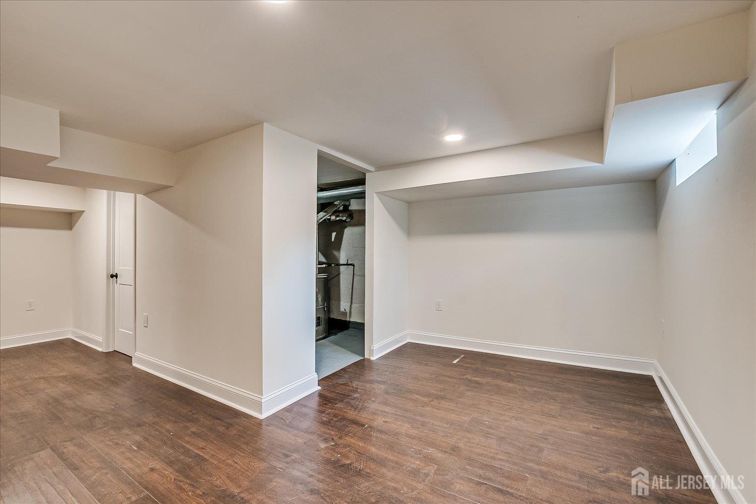 140 Oakview Avenue Maplewood, NJ 07040 - Photo 59 of 67 a view of an empty room with wooden floor and closet